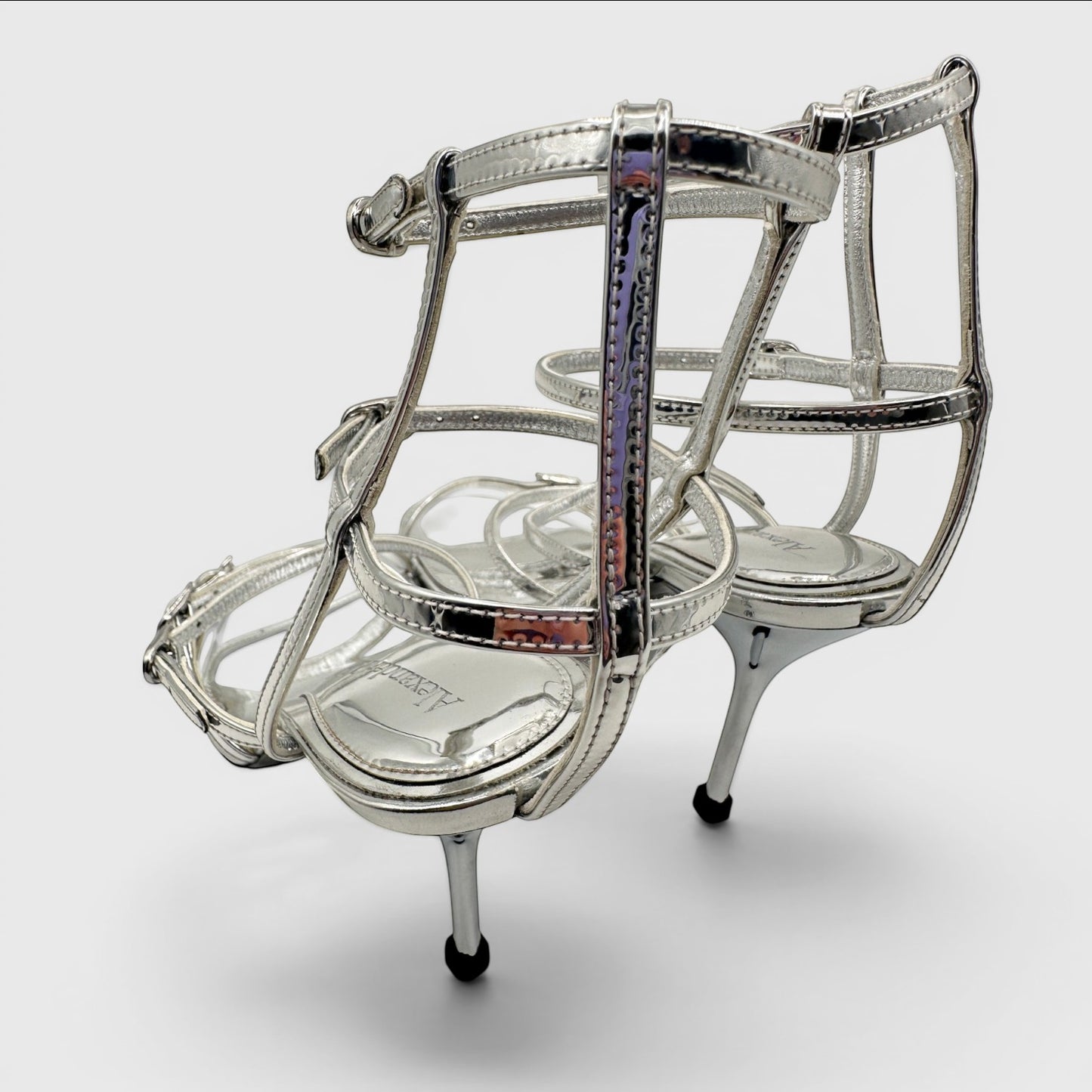 Alexander McQueen · luxury shoes · silver heels · stiletto · strappy sandals · designer footwear · prabangūs bateliai · second hand luxury · McQueen original · metallic sandals · Made in Italy · aukštakulniai · vestuviniai bateliai · vakariniai bateliai
Alexander McQueen silver sandals strappy heels stiletto sandals luxury shoes designer heels metallic sandals McQueen original box second hand luxury wedding heels evening sandals open toe heels buckle sandals Made in Italy