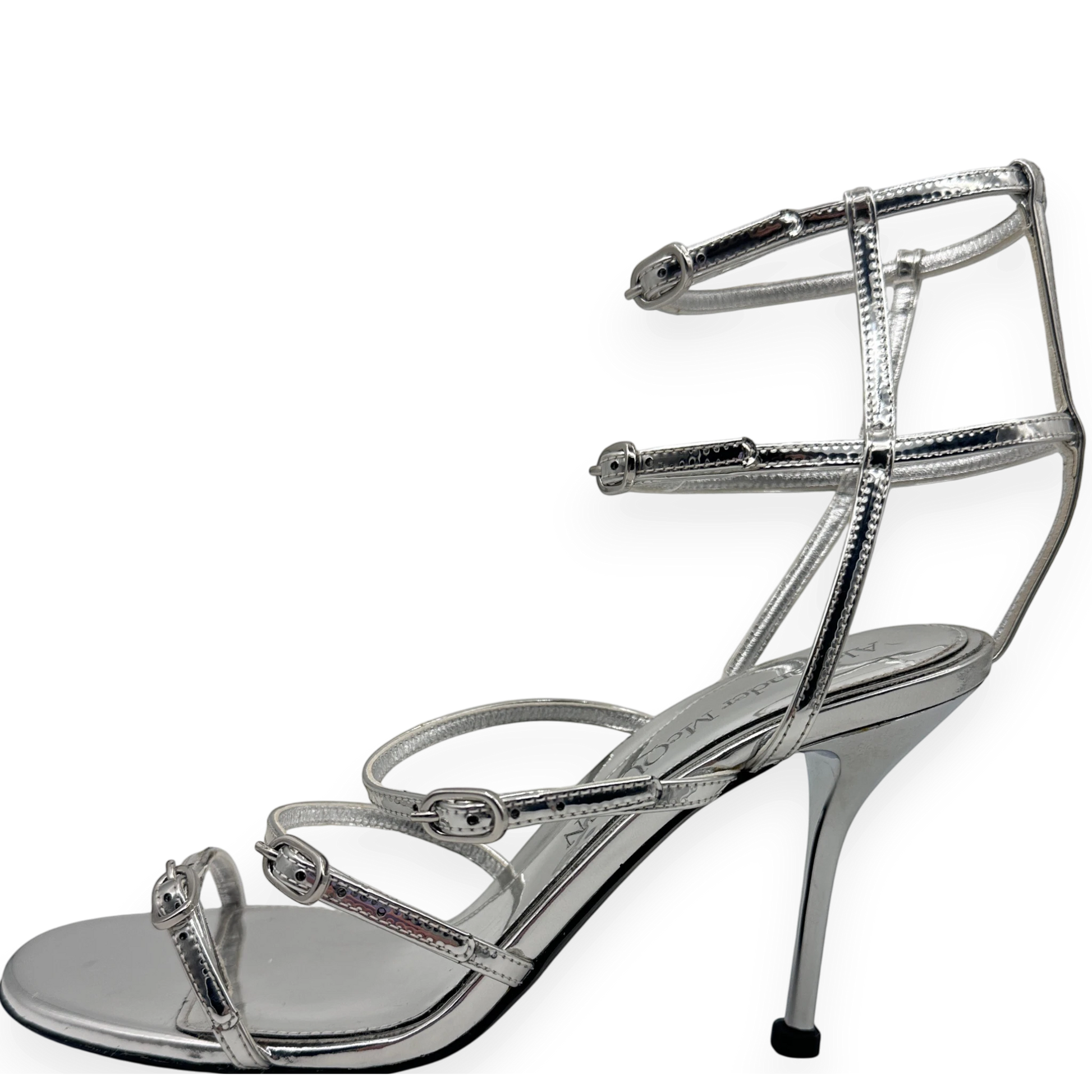 Alexander McQueen · luxury shoes · silver heels · stiletto · strappy sandals · designer footwear · prabangūs bateliai · second hand luxury · McQueen original · metallic sandals · Made in Italy · aukštakulniai · vestuviniai bateliai · vakariniai bateliai
Alexander McQueen silver sandals strappy heels stiletto sandals luxury shoes designer heels metallic sandals McQueen original box second hand luxury wedding heels evening sandals open toe heels buckle sandals Made in Italy